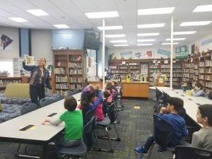 Ms. Shreve is reading us the "Wonkey Donkey"!