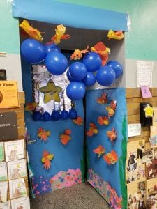 We are studying goldfish! Our door for March is Reading Month is decorated with goldfish we made from tissue paper and recycled water bottles!