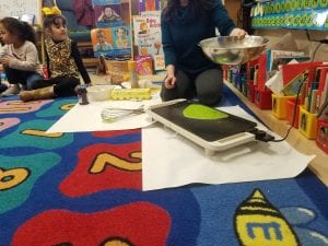 We made green eggs and jam after reading Dr. Seuss book, Green Eggs and Ham. Please encourage your child try a new food like the character in this book.