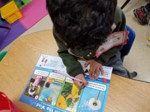 We circle the sight word up where it appeared in our article about wind!