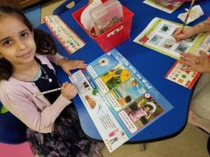 We circle the sight word up where it appeared in our article about wind!