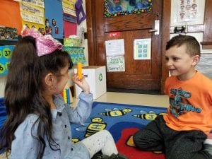 We worked on number bonds of 5. The children had towers of 5...but it behind their back...broke it into two towers...They asked their partner... "How many is behind my back?"   then they asked... "How do you know?" You can play this game with them using 5 pennies too.