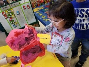We made butterflies! We learned that a butterflies wings are symmetrical. We demonstrated this by painting one side of the wings, folding it over and making the same print on the other side.
