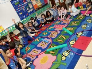 We have been learning about composing and decomposing teen numbers. Here we made a large number bond as we represented the teen number as one group of ten and some extra ones.
