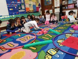 We have been learning about composing and decomposing teen numbers. Here we made a large number bond as we represented the teen number as one group of ten and some extra ones.