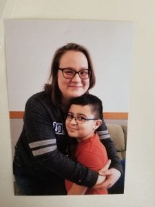 Ms. Rangel Loving hugging her student of the month, Hussien Elchami.