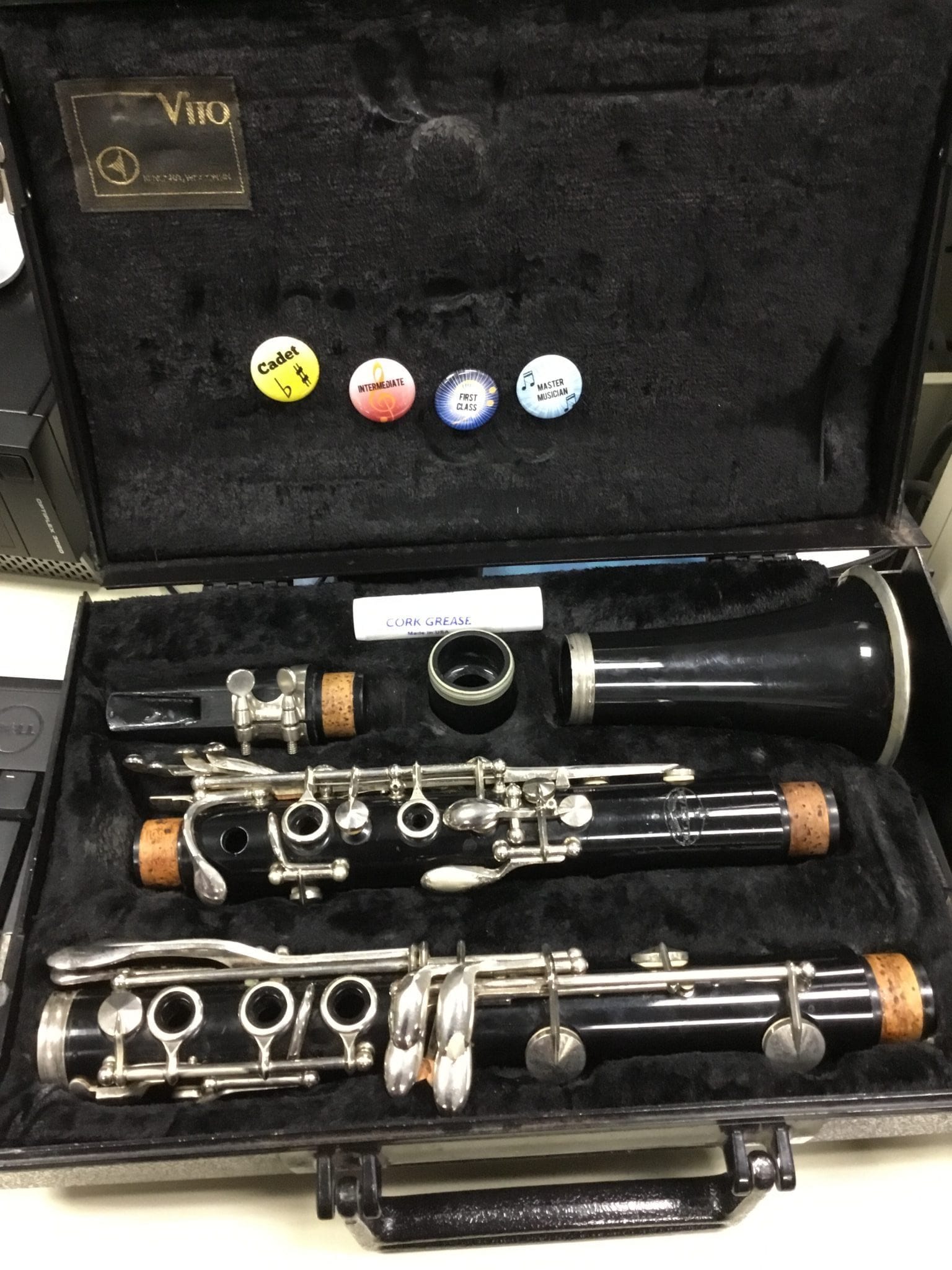 This young musician will not be losing pins. They are all stored in a very safe place - in the case and ready to wear for our Spring Concert. :D