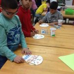 Students are designing their Sugar Skulls
