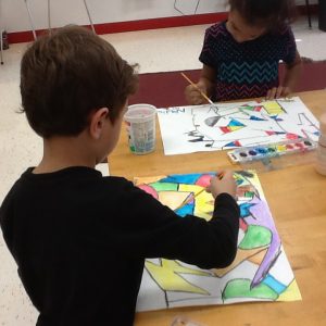 Students are painting their Abstract Artworks