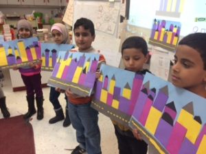 Students are showing the progress of the Cityscape Collage