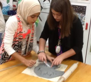 students are cutting the leaf shape bowl