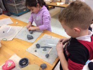 Students shaping the rose