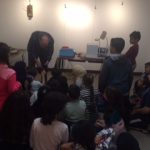 The artist Dan Gumina demonstrating to Miller students at Artspace.