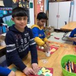 Third graders working on their collage