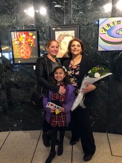 A student and her mom with the Teacher  at the Art Show 
