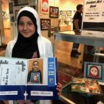 Anhar infront of the showcase