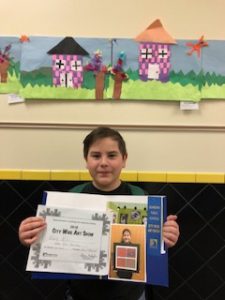 Sam A. Showing his Certificate