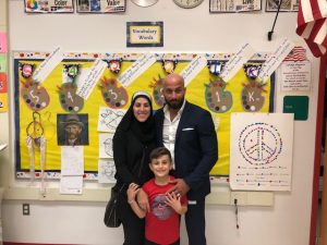 One family posing in the art room