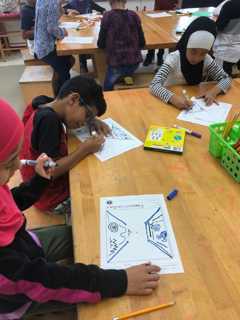 4th graders are designing their Pinwheel for the International Day of Peace.