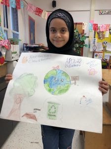 Students are showing their poster after they finished it.