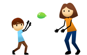 Boy and mom playing balloon volleyball.