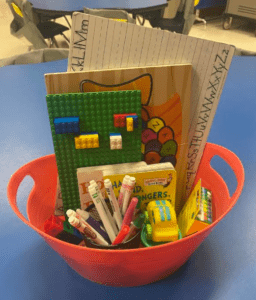Plastic Basket with activities for kindergarteners to use when finished or during a break.