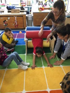 Students go through the steam roller which provides deep pressure and help builds body awareness and shoulder strength - two important things for student success!! 