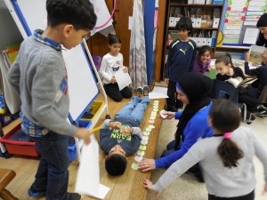 Karim's turn to be measured!