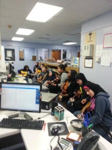 guitar class plays for office